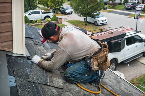 Professional Roofing technician working in North Bend, PA